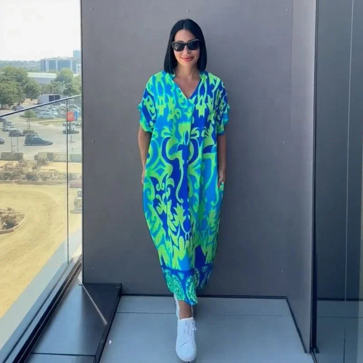 Gayathri - Elegante Abito lungo Con Motivo Floreale e Scollo a V