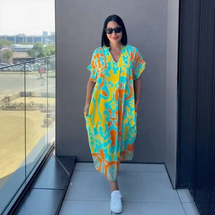Gayathri - Elegante Abito lungo Con Motivo Floreale e Scollo a V