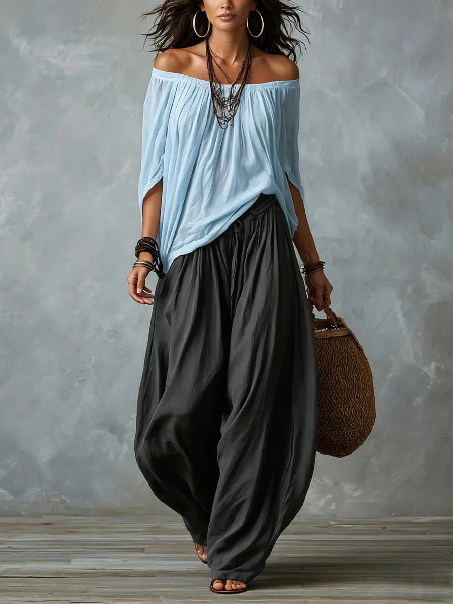Joryna - Set composto da top asimmetrico e pantaloni palazzo larghi