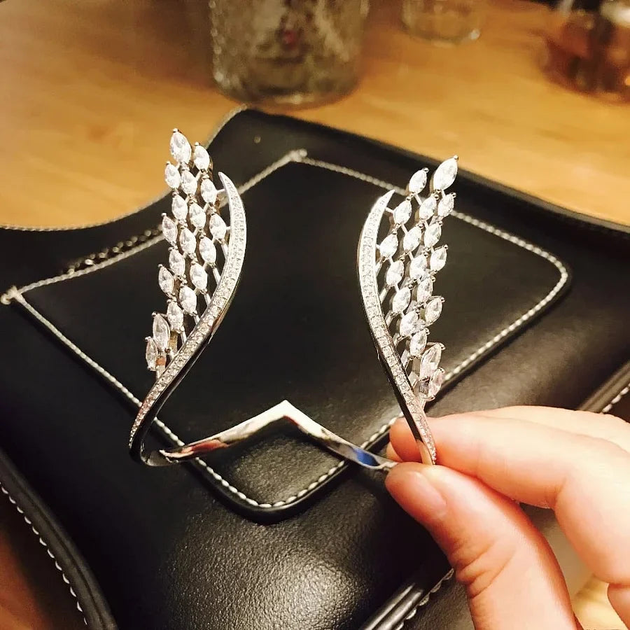 Evita - Bracciale e Anello con ali d'angelo