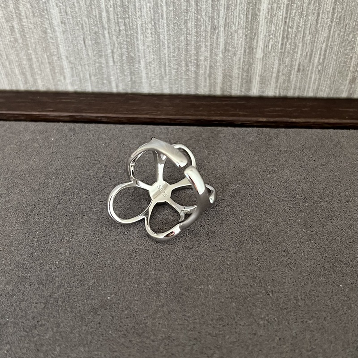 Nakoa - Anello con Petali in Argento Sole Splendente
