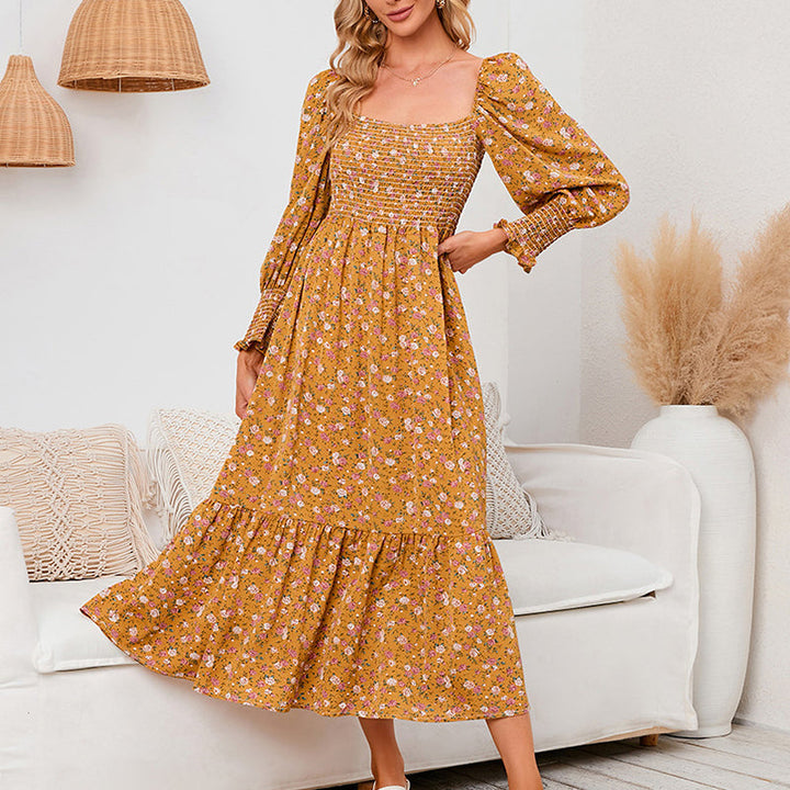 Vasilya - Abito Elegante con Maniche Svasate e Motivo Floreale